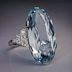 Oval Aquamarine and Diamond Gemstone Ring